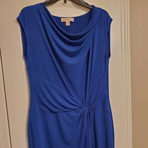 It's a blue Michael Kors dress